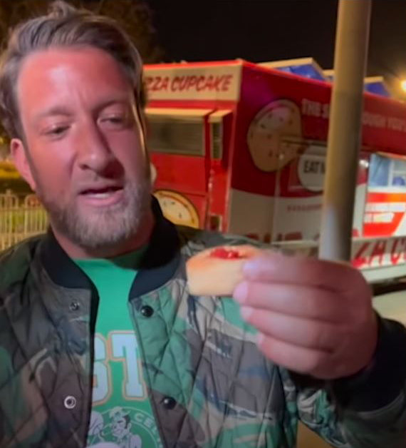 A man holding cup cake pizza